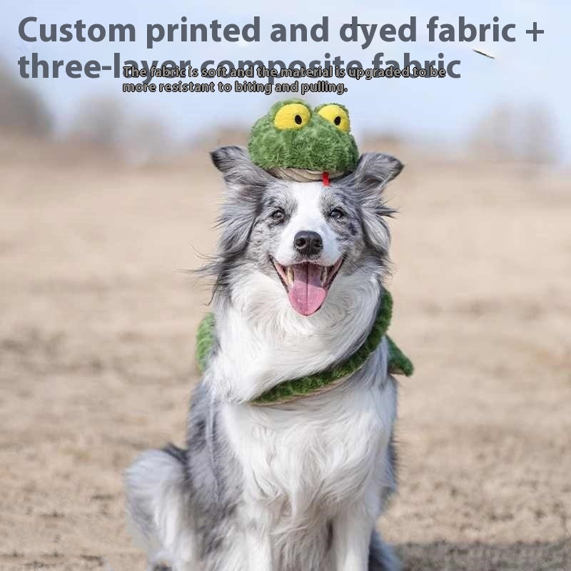 Happy dog wearing Brighty Boa XL green snake plush toy – soft three-layer fabric