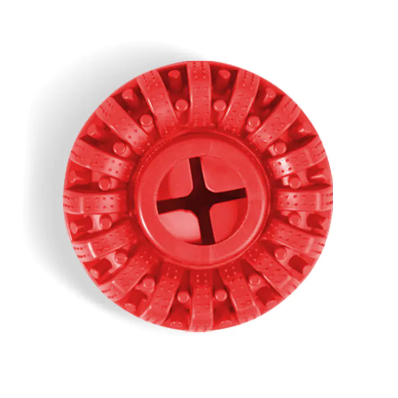 Top view of Brighty ChewWheel in red with textured spokes and treat compartments
