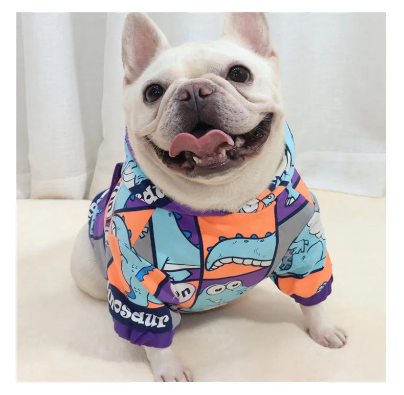 Happy French Bulldog sitting and wearing Brighty DinoWarm cozy dinosaur dog hoodie in size L