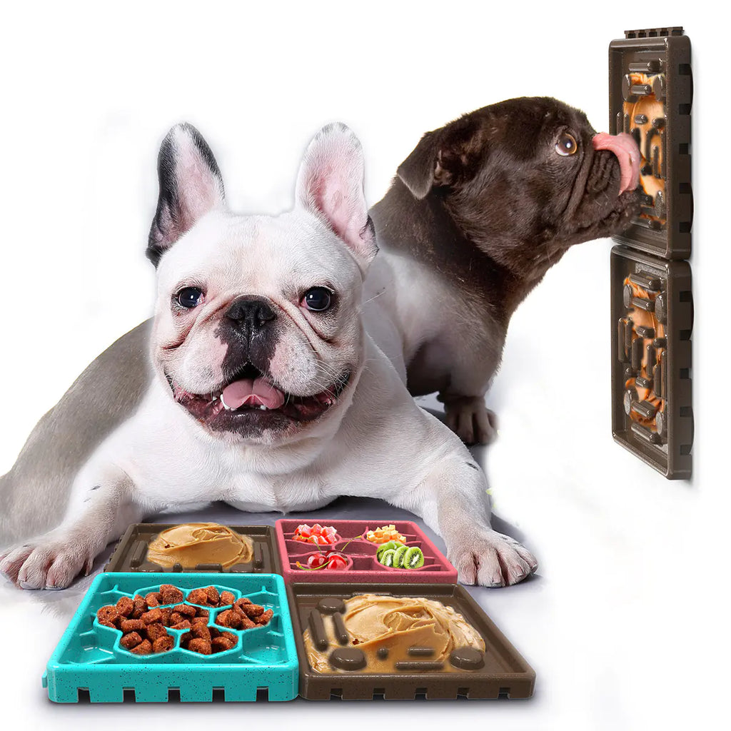 Dogs licking Brighty Calm silicone mats with peanut butter - wall mounted and floor mats
